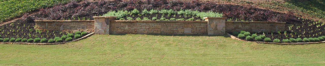 Low stone wall with columns
